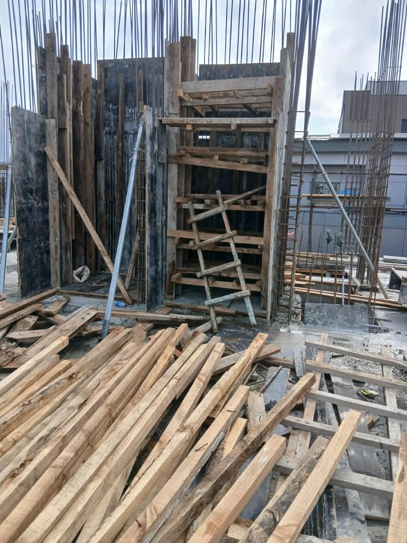 Formwork carpentry and temporary timber supports at the Eko Hotel site — Eko Hotel, Victoria Island, Lagos