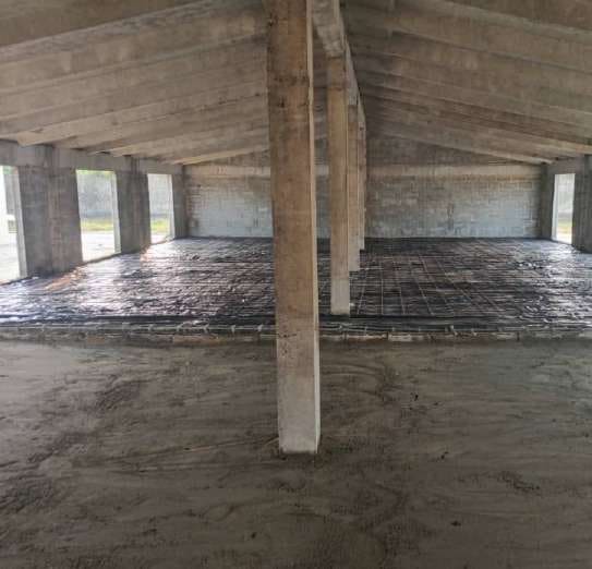 Reinforcement laid across the interior slab between concrete columns — HFP Shopping Complex, Lagos