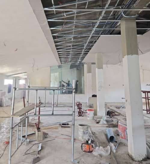 Suspended ceiling grid above the banking hall — HFP Shopping Complex, Lagos