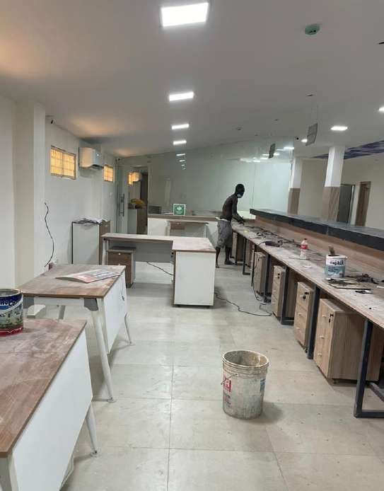 Desk and counter joinery during installation — HFP Shopping Complex, Lagos