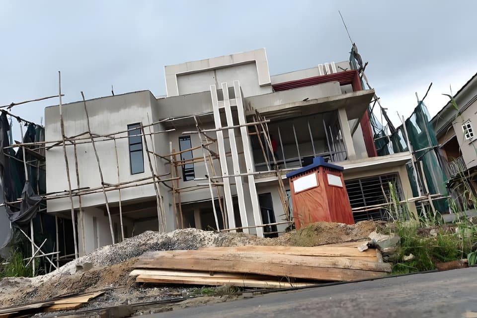 Front elevation with scaffolding and unfinished blockwork — Lakeview Park, Lekki, Lagos